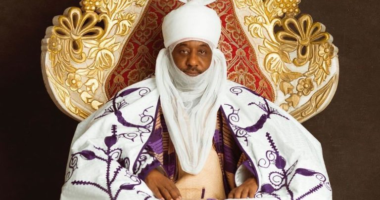 Yusuf presents letter of appointment to Emir Sunusi